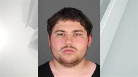 Albany man arrested after breaking window with brick